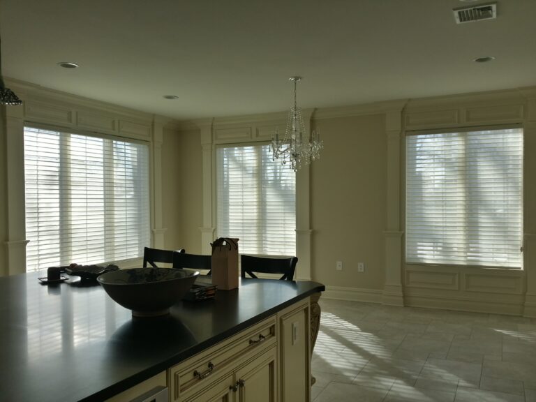 Custom roman shades fitted in a living room in Bergen County, NJ