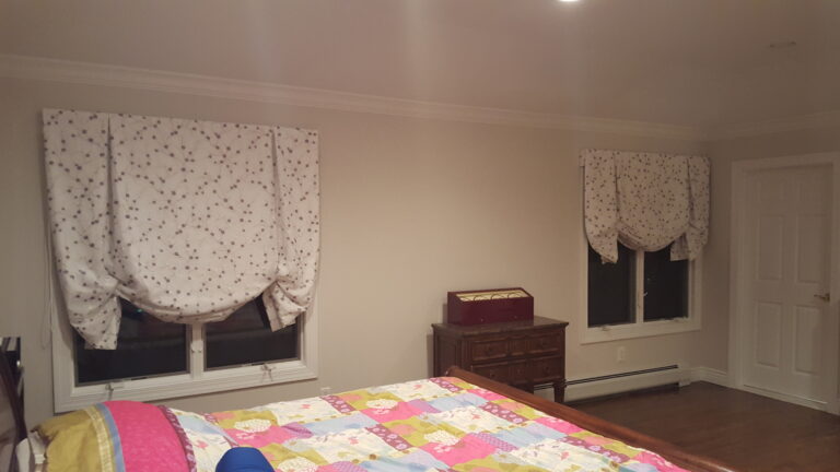 Roman shades in a bedroom in a Bergen County home