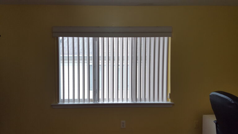 Vertical blinds measured and fitted for a Bergen County living room