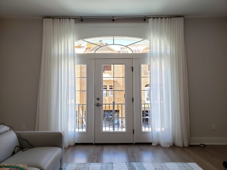 Sheer shadings in a Bergen County living room on a sliding glass door