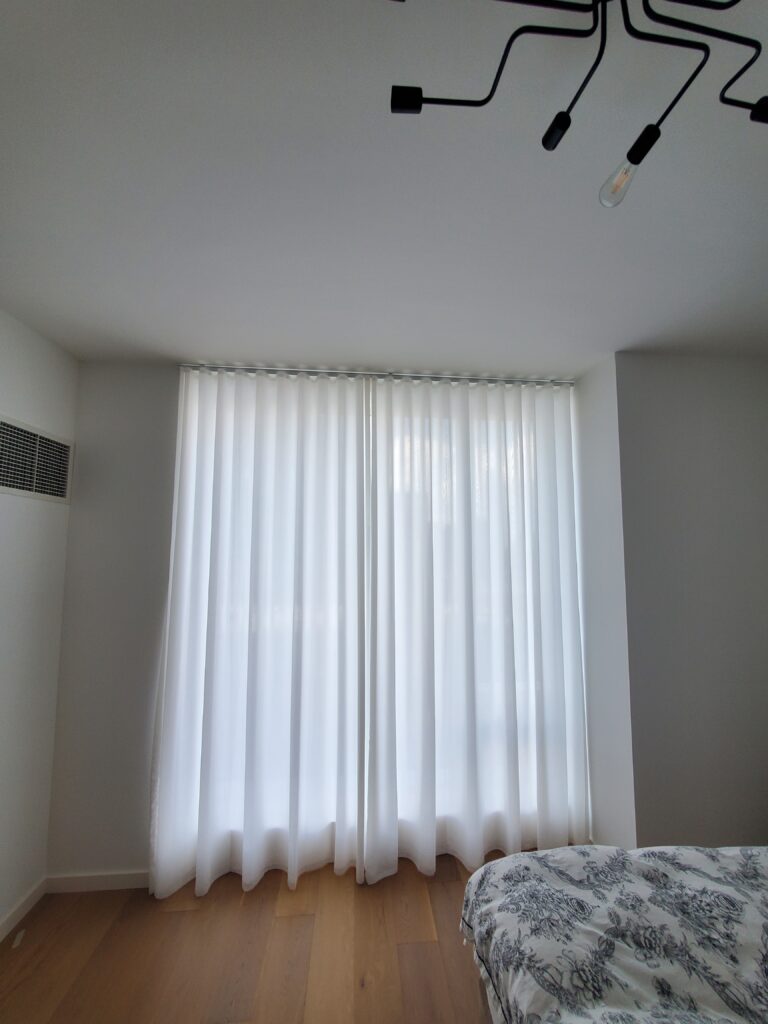 sheer shadings in a Tri-State living room across floor-to-ceiling windows, made to measure