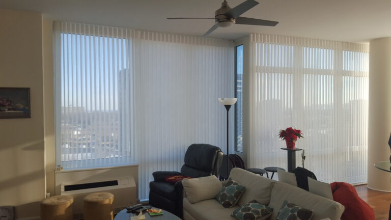 Vertical privacy sheers in a living room in a Bergen County home