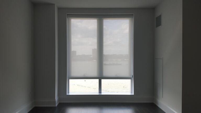 Roller shades installed in a New Jersey living room