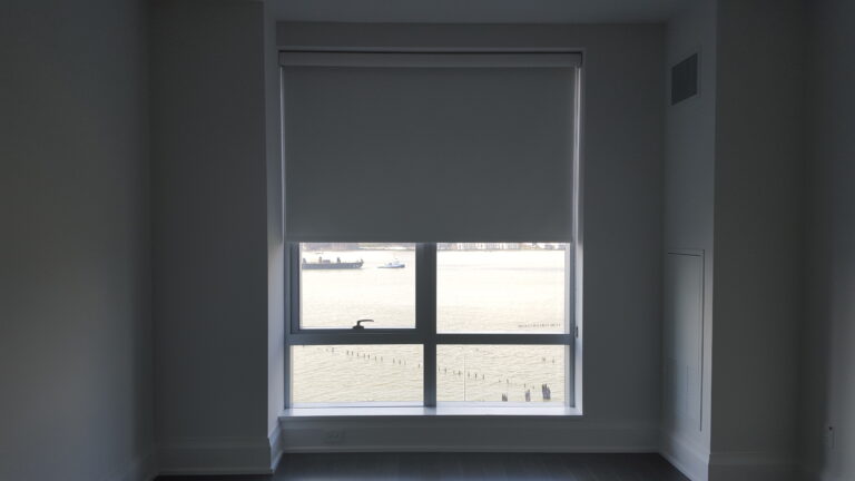 Roller shades measured and fitted for a Bergen County living room