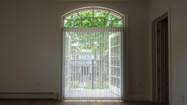 Sheer shadings measured and fitted for a Bergen County living room on a sliding glass door