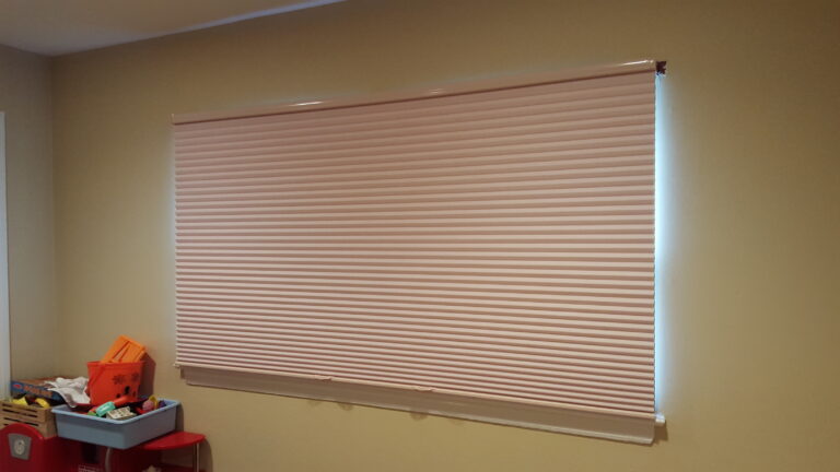 Cellular honeycomb shades in a Bergen County living room