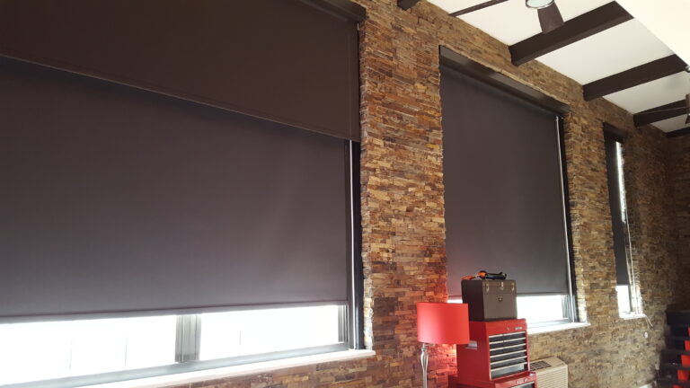 Custom roller shades fitted in a living room in Bergen County, NJ