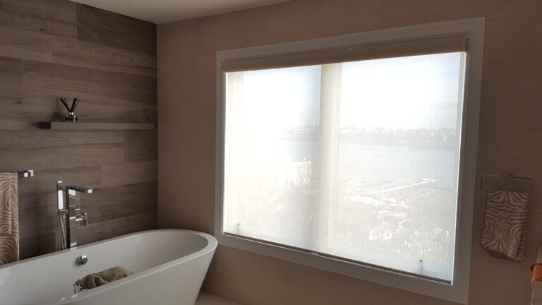 Roller shades installed in a New Jersey bathroom