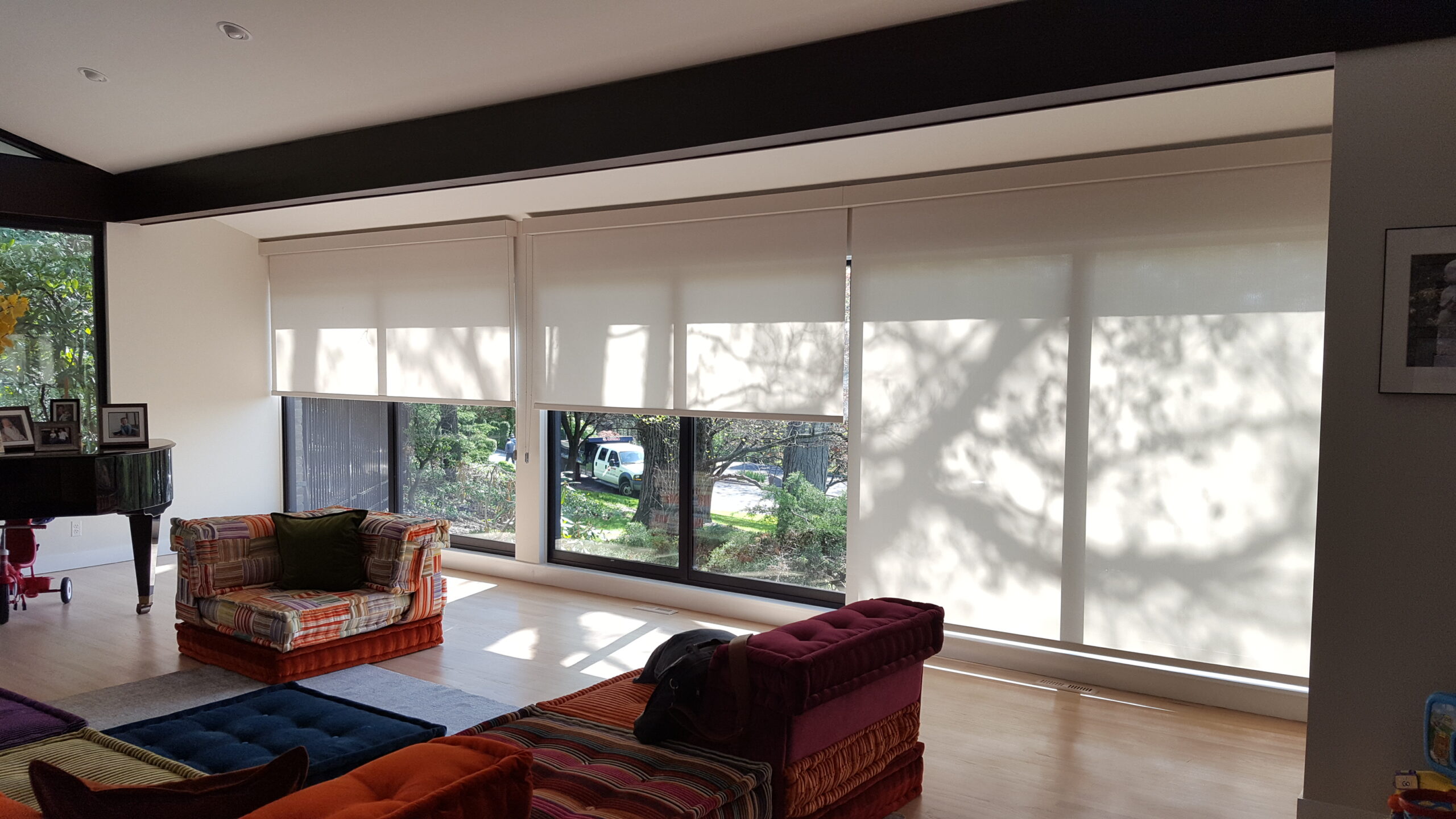 Roller shades measured and fitted for a Bergen County living room on a sliding glass door
