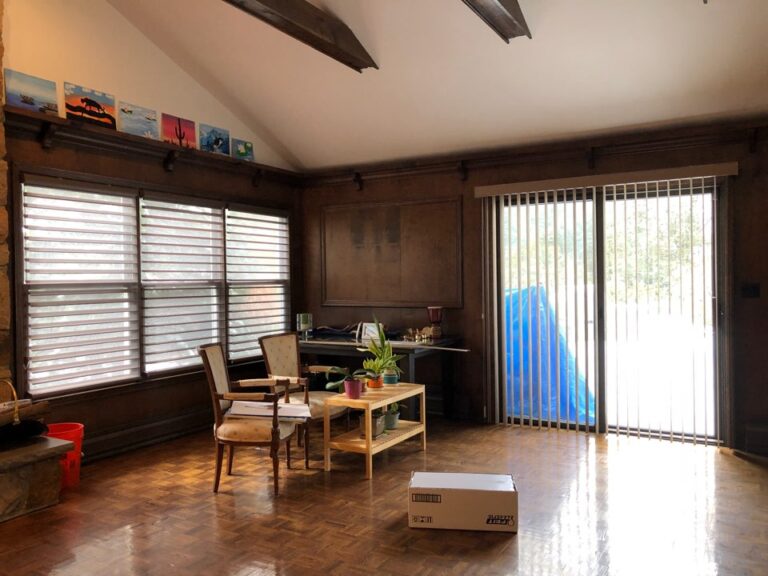 Wood blinds in a Bergen County dining room on a sliding glass door