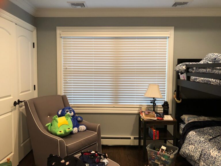 Wood blinds in a bedroom in a Bergen County home