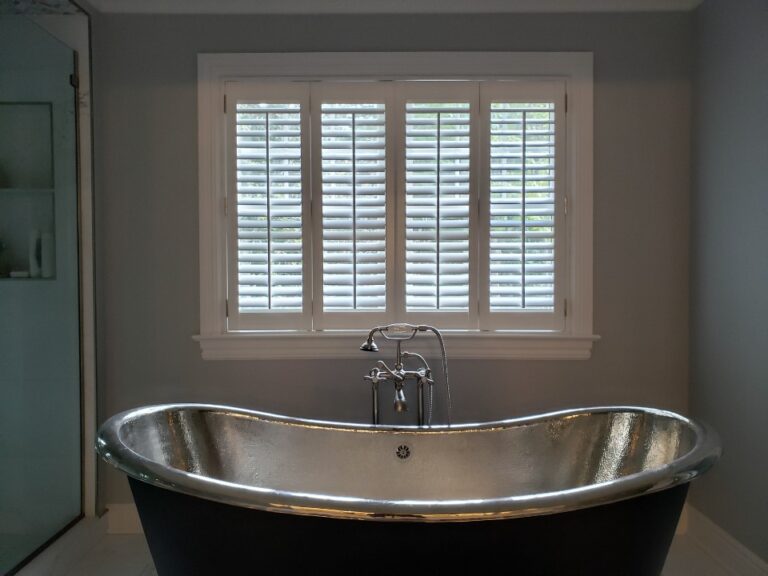 Plantation shutters in a bathroom in a Bergen County home