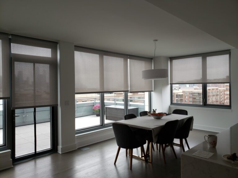 Custom roller shades fitted in a living room in Bergen County, NJ