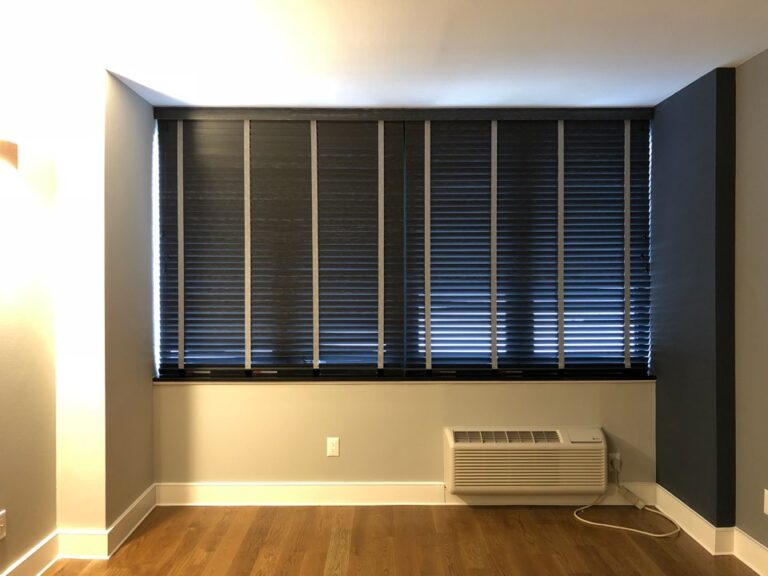 Wood blinds in a living room in a Bergen County home
