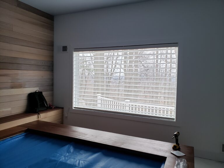 Roller shades installed in a New Jersey bedroom