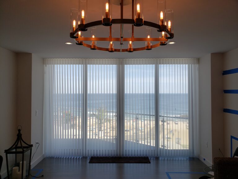 sheer shadings in a Tri-State living room across floor-to-ceiling windows, made to measure