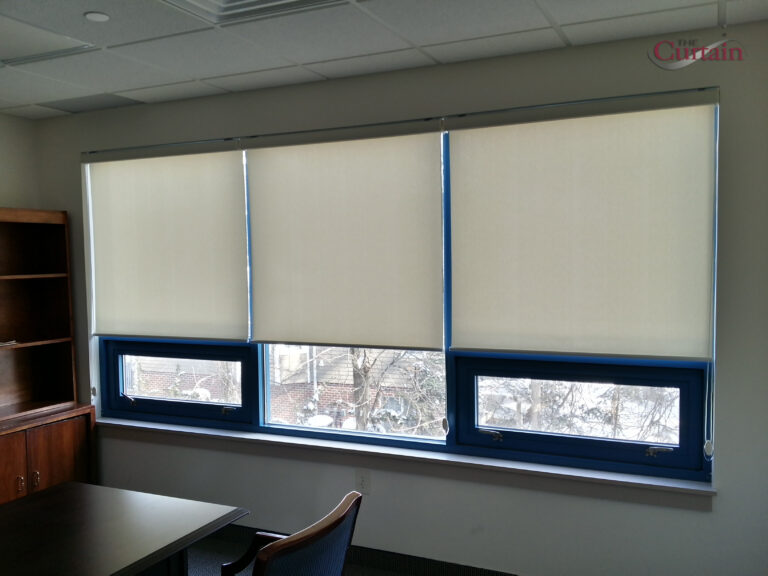 Roller shades measured and fitted for a Bergen County commercial space