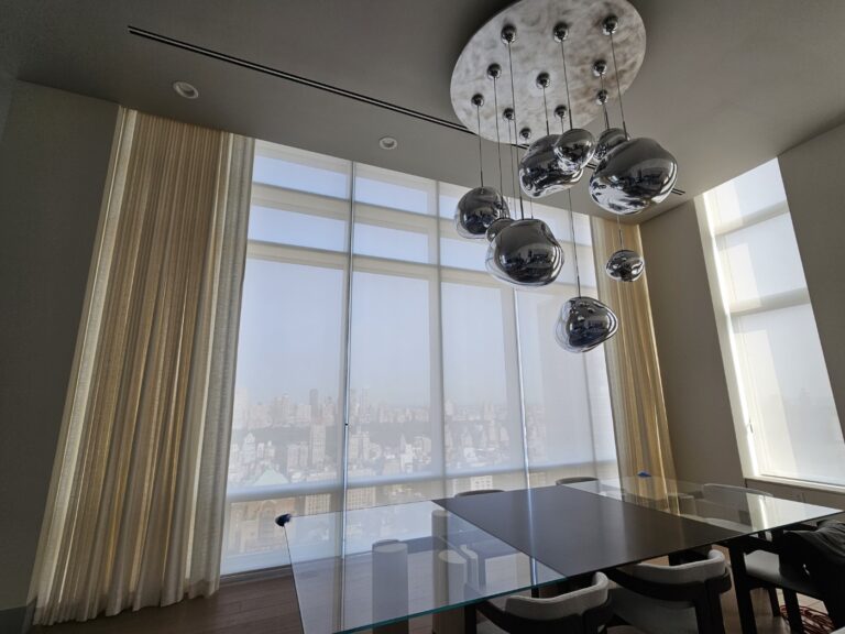 Motorized Hunter Douglas shades in a real home