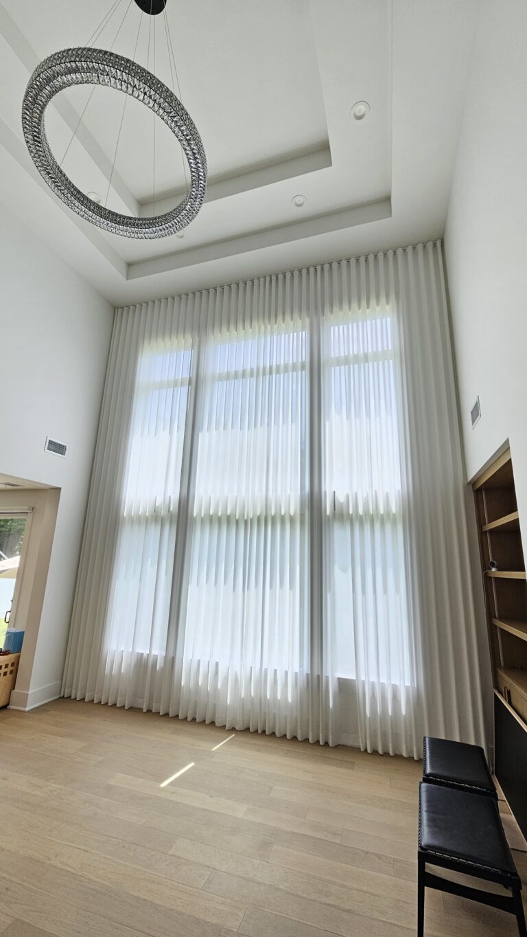sheer shadings in a Tri-State living room across floor-to-ceiling windows, made to measure