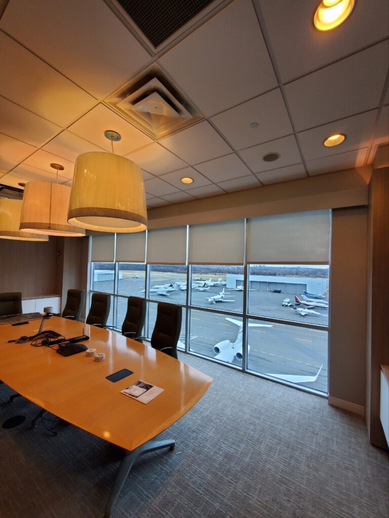 roller shades in a Tri-State commercial space, made to measure