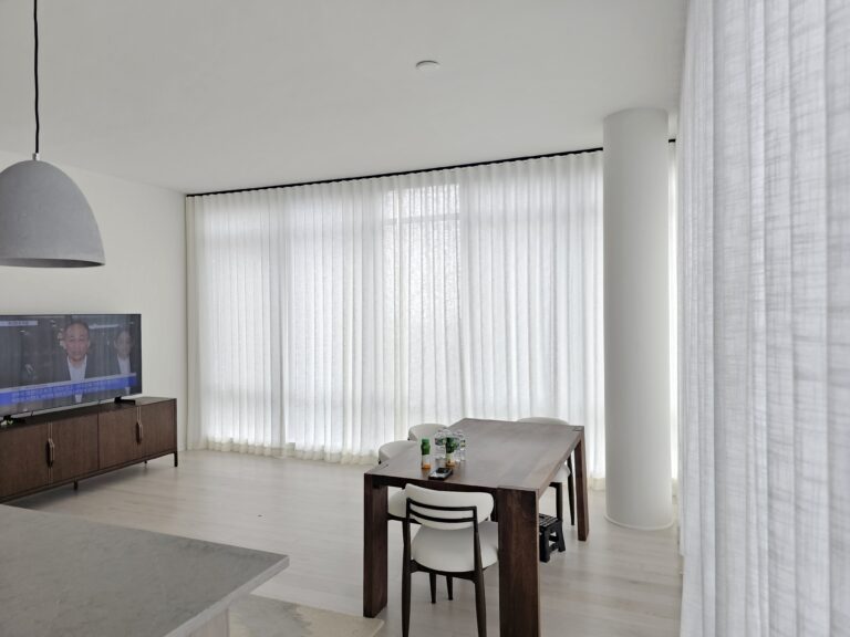 Custom drapery framing a large window