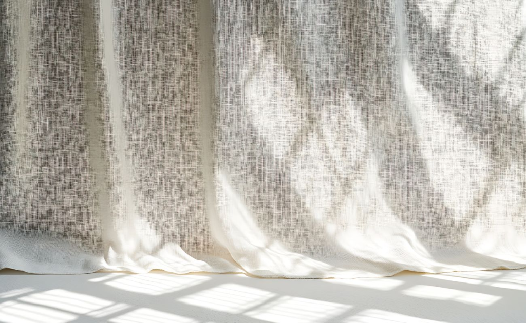 should curtains touch the floor