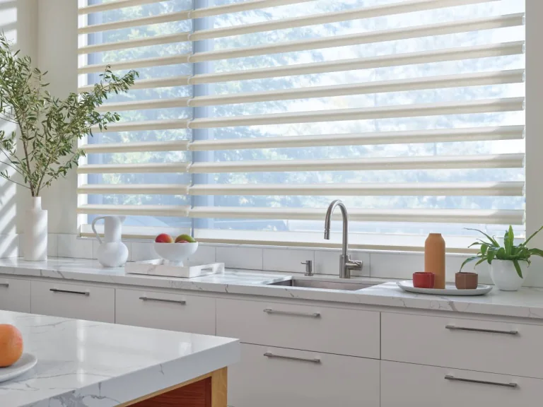 Motorized smart shades in a bright kitchen